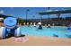 Outdoor pool with people enjoying low impact exercises, perfect for fitness and recreation in the community at 6501 Stone River Rd # 209, Bradenton, FL 34203