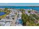 Scenic aerial view of the community, with lush landscaping and beautiful waterfront scenery at 7 Braden Castle Dr, Bradenton, FL 34208