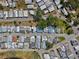 This aerial shows the layout and surrounding landscaping of a manufactured home community at 7 Braden Castle Dr, Bradenton, FL 34208