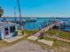 Community boat docks and marina featuring maintained docks, boat slips and waterfront access at 7 Braden Castle Dr, Bradenton, FL 34208