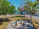 Lovely waterfront memorial featuring patriotic symbols, landscaping, and scenic views of the water at 7 Braden Castle Dr, Bradenton, FL 34208