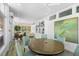 Charming clubhouse with a cozy dining area, bookshelves, and a serene atmosphere perfect for relaxation at 71 Tidy Island Blvd, Bradenton, FL 34210