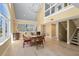 Open concept living and dining area with cathedral ceiling and waterfront views at 71 Tidy Island Blvd, Bradenton, FL 34210