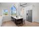 Spacious kitchen with island, marble countertops, stainless steel appliances, and natural light from large windows at 71 Tidy Island Blvd, Bradenton, FL 34210