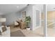 Office space featuring a wooden desk, comfortable seating, and a bright window at 71 Tidy Island Blvd, Bradenton, FL 34210