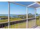 Screened in porch with a scenic view of the bay at 71 Tidy Island Blvd, Bradenton, FL 34210