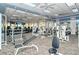 Modern fitness center with a variety of cardio and weight training equipment for a complete workout at 7664 Camminare Dr, Sarasota, FL 34238