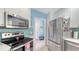 Well-equipped kitchen with stainless steel appliances and stylish backsplash at 7664 Camminare Dr, Sarasota, FL 34238