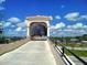 The Legacy Trail access point, featuring an enclosed walkway over a busy street at 7664 Camminare Dr, Sarasota, FL 34238
