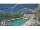 Beautiful private pool with screened lanai and relaxing waterfront views at 7664 Camminare Dr, Sarasota, FL 34238