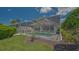 Relaxing screened-in pool area offers an ideal space for outdoor living and entertainment at 7664 Camminare Dr, Sarasota, FL 34238
