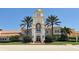 The Town Center features a clock tower and beautifully landscaped entrance at 7664 Camminare Dr, Sarasota, FL 34238