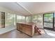 Relaxing hot tub on an enclosed porch with nice backyard view at 826 Lillian Ln, Sarasota, FL 34243
