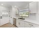 Bright kitchen featuring stainless steel appliances, stylish hardware, and lots of counter space at 826 Lillian Ln, Sarasota, FL 34243
