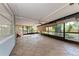 Spacious screened-in lanai with stamped concrete floors at 826 Lillian Ln, Sarasota, FL 34243