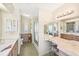 Well-organized bathroom with a vanity, makeup station, and separate toilet and shower area at 8534 Imperial Cir, Palmetto, FL 34221