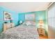 Serene bedroom featuring soothing colors, comfortable bedding, and ample natural light at 8534 Imperial Cir, Palmetto, FL 34221
