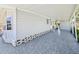 Spacious covered carport area offering protection from the elements and convenient access to the home at 8534 Imperial Cir, Palmetto, FL 34221