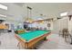 Community game room with two pool tables and seating, perfect for entertaining at 8534 Imperial Cir, Palmetto, FL 34221