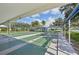Community shuffleboard courts covered from the elements with shade; beautiful lake views at 8534 Imperial Cir, Palmetto, FL 34221