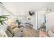 Relaxing sunroom with lots of natural light and comfortable seating area at 8534 Imperial Cir, Palmetto, FL 34221