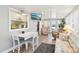 Relaxing sunroom with natural light, tile floors, and comfortable furniture at 8534 Imperial Cir, Palmetto, FL 34221