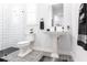 Modern bathroom featuring a walk-in shower, patterned tile floor, and elegant sink at 1007 143Rd Ne St, Bradenton, FL 34212