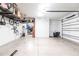 Clean, organized garage space with overhead storage and ample room for multiple vehicles at 1007 143Rd Ne St, Bradenton, FL 34212