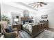 Spacious main bedroom with wooden furniture, ceiling fan, and bright natural light at 1007 143Rd Ne St, Bradenton, FL 34212