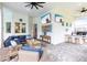 Spacious patio with outdoor seating area, bar seating, and mounted televisions at 1007 143Rd Ne St, Bradenton, FL 34212