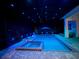 Sparkling swimming pool and spa are enhanced by a screened enclosure with outdoor seating at 1007 143Rd Ne St, Bradenton, FL 34212