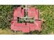 Aerial view of a residential complex with red tile roofs surrounded by lush greenery at 1111 W Faith Cir # 2004, Bradenton, FL 34212