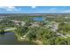 Aerial view of the community featuring lakes, homes, and recreational facilities at 12272 Stuart Dr, Venice, FL 34293