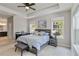 Comfortable main bedroom offers lots of natural light and ample space for a bedroom set at 12272 Stuart Dr, Venice, FL 34293
