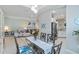 Dining room open to the kitchen and living area, great for entertaining at 12272 Stuart Dr, Venice, FL 34293