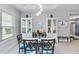 Stylish dining room featuring elegant decor and ample seating at 12272 Stuart Dr, Venice, FL 34293