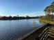 Scenic view from the dock of a tranquil pond reflecting the sky at 12272 Stuart Dr, Venice, FL 34293