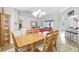 Bright dining room with chandelier, natural light, and view to other rooms in the home at 15107 3Rd E Dr, Bradenton, FL 34212