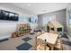 Playroom with toys, table and chairs and TV at 16016 Sunny Day Dr, Bradenton, FL 34211