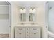 Beautifully updated bathroom featuring double sinks, modern vanity and fixtures at 2601 13Th W St, Palmetto, FL 34221