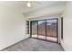 Bedroom featuring sliding glass doors leading to a patio at 2601 13Th W St, Palmetto, FL 34221