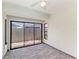 Bedroom featuring sliding glass doors leading to a patio at 2601 13Th W St, Palmetto, FL 34221