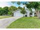Charming single-story home with a well-manicured lawn and an attached two-car garage at 2601 13Th W St, Palmetto, FL 34221