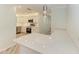 Bright kitchen featuring granite countertops, stainless steel appliances, and white cabinets at 2601 13Th W St, Palmetto, FL 34221