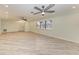 Bright living room with lots of space and a neutral color scheme, ceiling fans, and recessed lighting at 2601 13Th W St, Palmetto, FL 34221