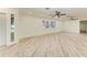 Bright living room with lots of space and a neutral color scheme, ceiling fans, and recessed lighting at 2601 13Th W St, Palmetto, FL 34221
