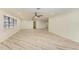 Bright living room with lots of space and a neutral color scheme, ceiling fans, and recessed lighting at 2601 13Th W St, Palmetto, FL 34221