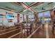 Inviting dining area with comfortable seating, stylish decor, and large windows with water views at 275 Sapphire Lake Dr # 101, Bradenton, FL 34209
