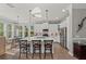 Spacious kitchen with stainless steel appliances, a center island, and bar stool seating at 275 Sapphire Lake Dr # 101, Bradenton, FL 34209