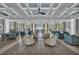 Spacious lounge area with ample seating, large windows, and elegant decor at 275 Sapphire Lake Dr # 101, Bradenton, FL 34209